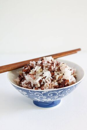 Steamed rice in a China cup.の写真素材