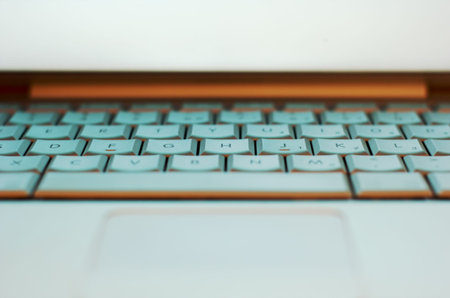 Light blue metallic laptop keyboardの写真素材
