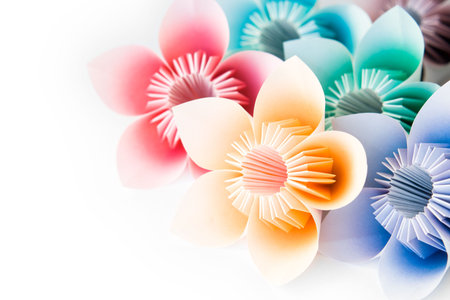 Multi colour origami flowers on a white backgroundの写真素材
