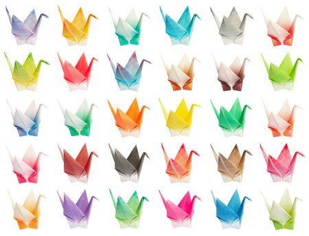 A collection of 30 colourful origami birds. They're all isolated on a pure white background therefore easy to be rearranged into different patterns の写真素材