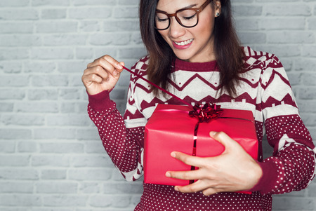 Asian women are happy to receive a gift box in the festival, Focus on face.