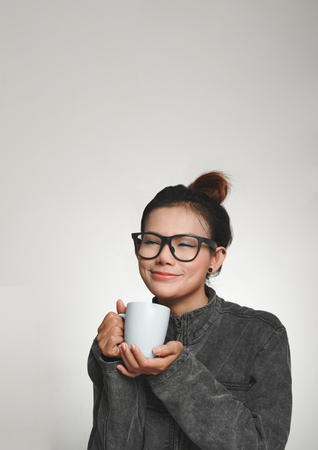 The joy of Asian women who have drink.Focus on faceの写真素材