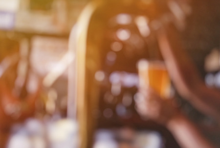 The atmosphere in the restaurant was a blur. In a bunker for the beer into a glass. Soft evening sunshine Ideal for relaxing.の写真素材