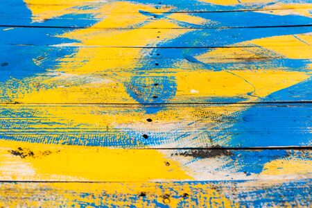 The wood was drained in yellow and blue.の写真素材