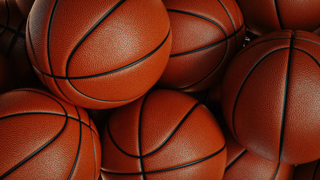 Close-up shot of orange basketball The background is orange.の写真素材