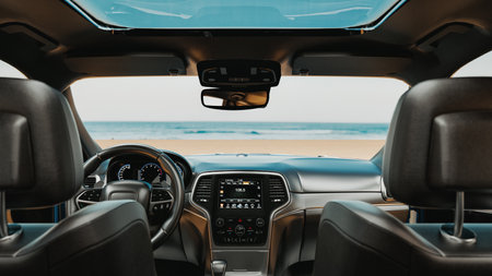 Image of the interior of a car parked on the beach.. 3d, rendering, illustration,の写真素材