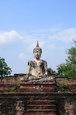 Buddha sit on ruins temple in sukhothai unescoの写真素材