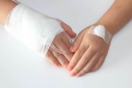 Children hand with bandage
