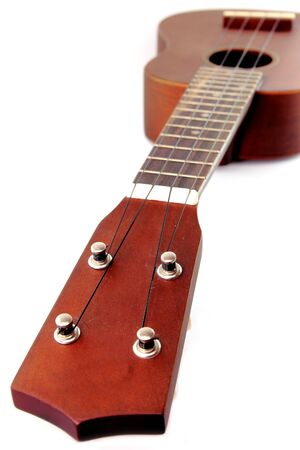 Vintage closeup ukulele  on white isolated.の写真素材