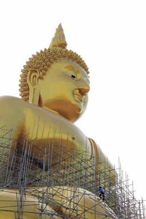 Painter on Golden buddhaの写真素材