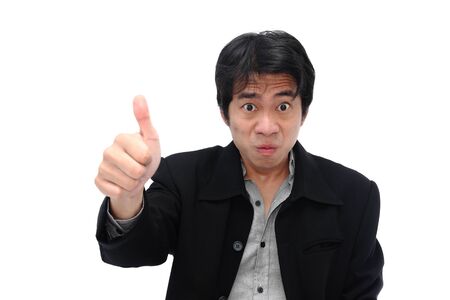 Panic businessman showing thumbs up gesture isolated on white backgroundの写真素材