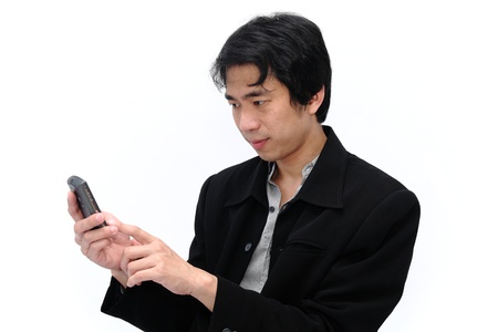 Happy Businessman holding a cell phone for communicationの写真素材