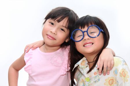 Portrait of two asian girls and best friends with happyの写真素材