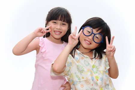 Portrait of two asian girls and best friends with happyの写真素材