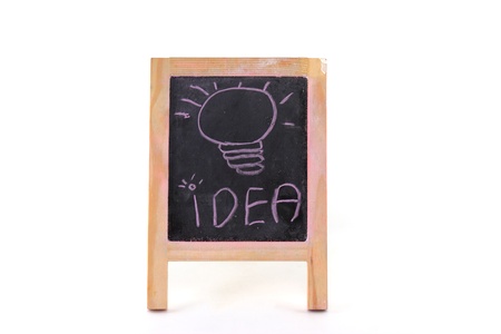 Bulb idea on black board の写真素材