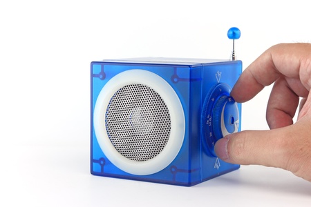 Hand tuning or turning Blue radio cube boxの写真素材