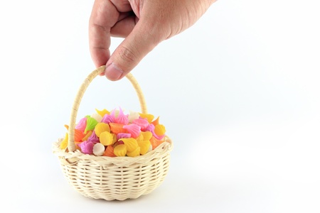Hand keep colorful sweetness Thai style dessert in basketの写真素材