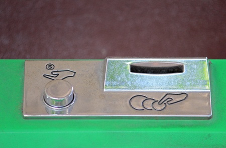 Slot of insert coin and coin return buttonの写真素材