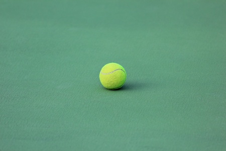 Tennis ball on tennis courtの写真素材