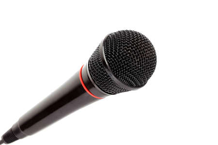Closeup black microphone on white backgroundの写真素材