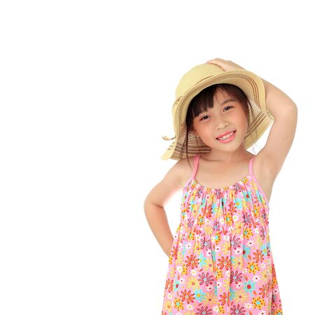 Beautiful happy little asian girl with strawの写真素材