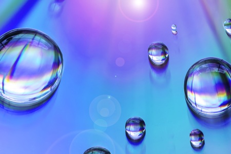Macro of water drops on multicolor backgroundの写真素材