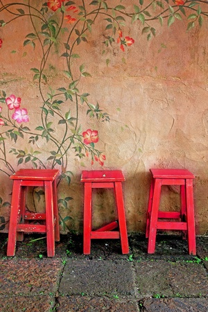 old vintage wooden chair and wallの写真素材