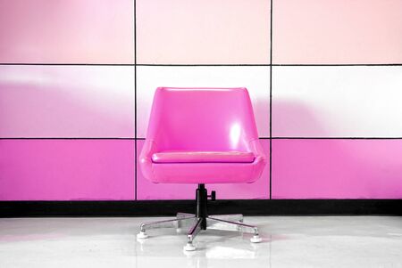 Pink chair and modern wallの写真素材