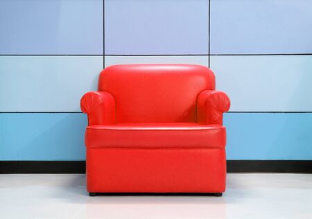 Red sofa and modern wallの写真素材