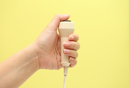 hand pushing nurse call buttonの写真素材