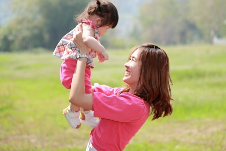 Mother and daughter in the parkの写真素材