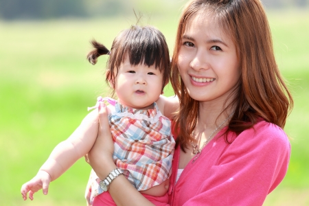Mother and daughter in the parkの写真素材