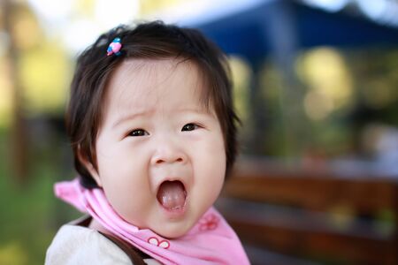 Cute hapy little baby girlの写真素材