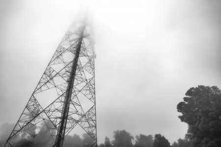 communication antenna tower in the mistの写真素材