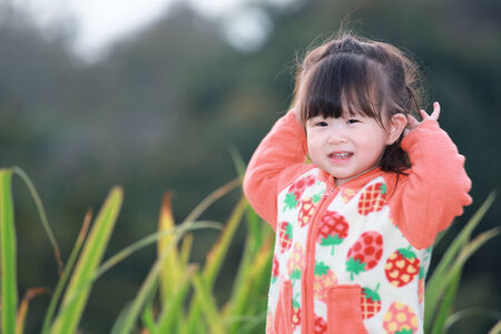 Happy little girlの写真素材