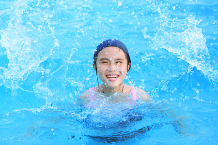children girl in swimming poolの写真素材