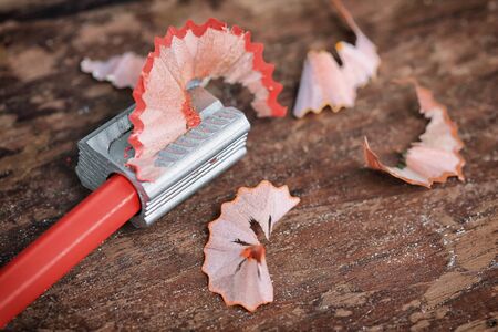 Pencil Sharpener on wooden wallの写真素材