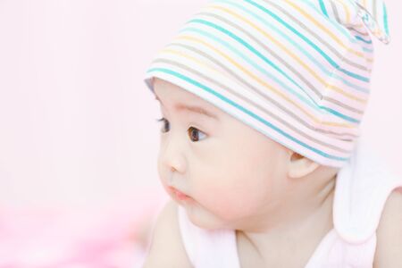 Portrait of an adorable baby boyの写真素材