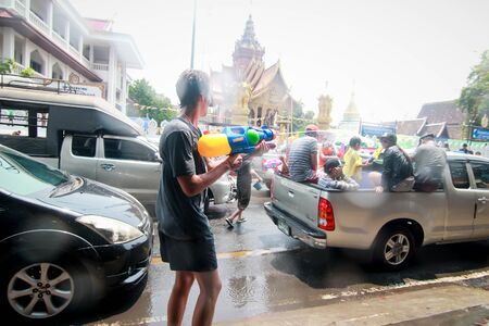 CHIANG MAI THAILAND-APRIL 14:Chiang mai Songkran festival. Foreign tourists and Thai people enjoy splashing water. on April 13,2014 in Chiang mai,Thailand.のeditorial素材