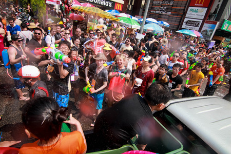 CHIANG MAI THAILAND-APRIL 14:Chiang mai Songkran festival. Foreign tourists and Thai people enjoy splashing water. on April 13,2014 in Chiang mai,Thailand.のeditorial素材