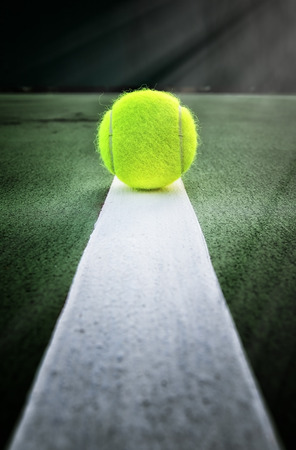 Tennis ball on tennis courtの写真素材