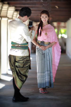 Couple thai dress in the old templeの写真素材