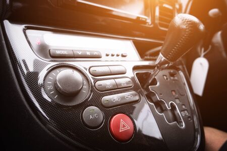Car console panel with sun raysの写真素材