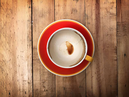 Empty coffee cup on wooden background