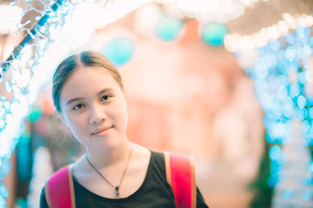 Girl traveler with backpackの写真素材