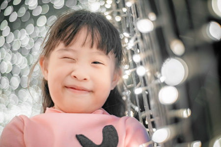 Happy little girl enjoying in new year festivalの写真素材