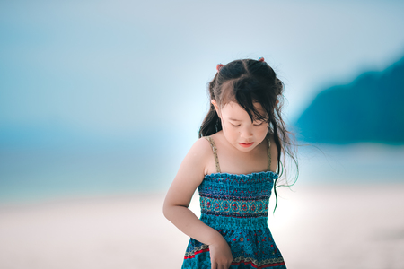 Little girl relax on the beachの写真素材