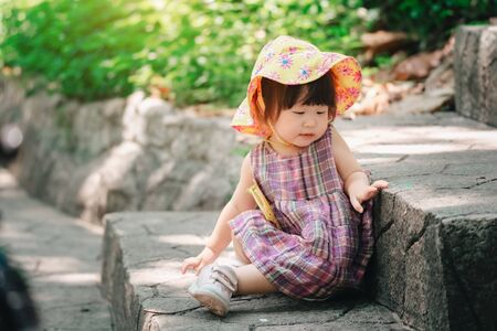 Cute asian little girl summer travel