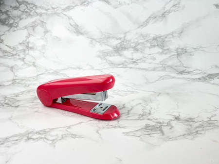 side view of red stapler ,stationery for back to school concept,の写真素材