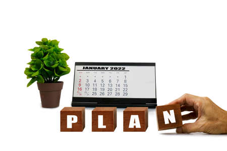 Lettering plan on cube block with calendra , Action plan banner for objective, strategy,...